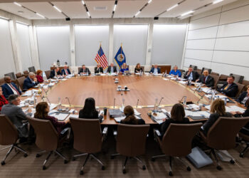 FOMC Holds Rates, Revises Forward Guidance