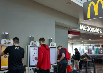 Who Loves Minimum Wage Laws? Kiosk Makers