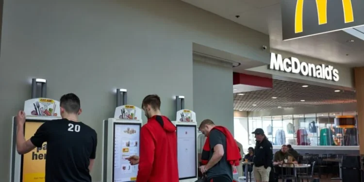 Who Loves Minimum Wage Laws? Kiosk Makers