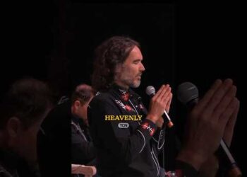 Russell Brand Prays Over Crowd